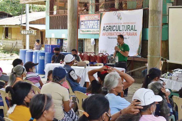 Farmers from Leon, Iloilo’s barangays of Bobon, Bulwang and Camandag participates in an agricultural information caravan in Barangay Camandag, Leon’s multipurpose gym. DA-6 PHOTO