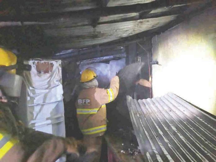 Bureau of Fire Protection investigators check this eatery in Bacolod City that fire hit late night on April 29, 2022. BFP-BACOLOD PHOTO