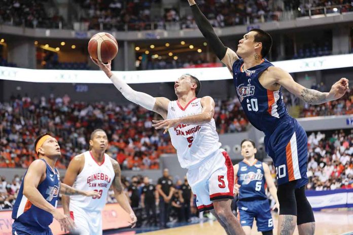 Barangay Ginebra San Miguel Kings’ LA Tenorio evades the defense of Meralco Bolts’ Raymond Almazan for a layup. PBA MEDIA BUREAU