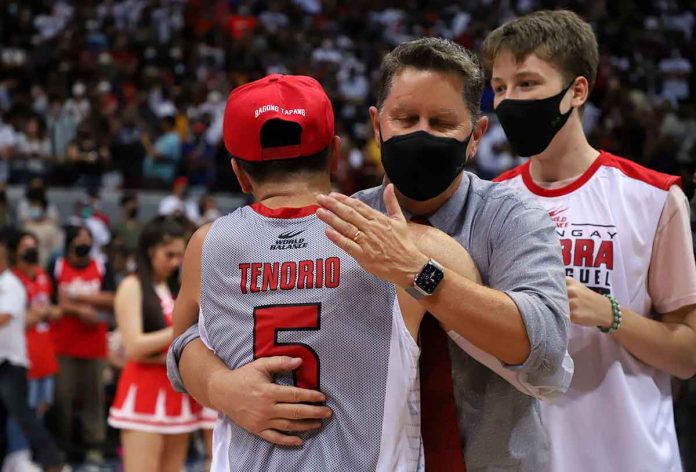 Barangay Ginebra San Miguel Kings head coach Tim Cone hugs LA Tenorio following their Game 6 win last Friday. PBA PHOTO