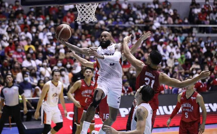 Meralco Bolts’ Tony Bishop attacks the Barangay Ginebra San Miguel Kings defense for a layup. PBA MEDIA BUREAU