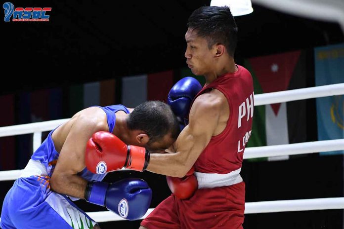 Negrense Rogen Ladon connects with a left uppercut to Amit Panghal of India during their men's flyweight gold medal bout in the 2022 Thailand Open International Boxing Tournament at the Angsana Laguna Phuket Resort Hotel. ABAP PHOTO