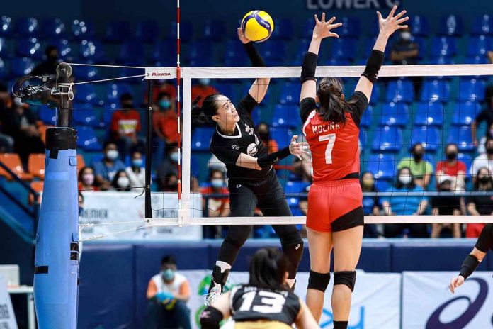 Ilongga Aiza Maizo-Pontillas of Petro Gazz Angels unloads an attack against the defense of Cignal HD Spikers’ Frances Molina. PVL MEDIA BUREAU