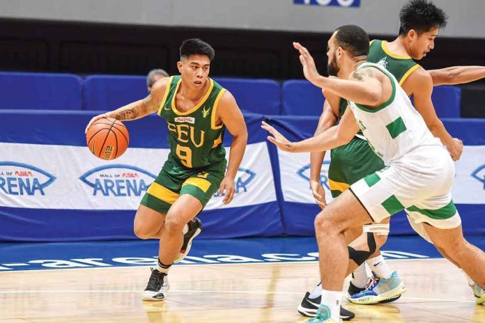 Ilonggo John Bryan Sajonia of Far Eastern University Tamaraws uses the screen of a teammate to get away from the defense of De La Salle University Green Archers Fil-Am import Bryan Phillips. UAAP MEDIA BUREAU