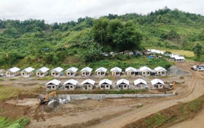 RESETTLEMENT SITE. Construction is ongoing for housing units intended for Indigenous Peoples (IP) affected by the government’s over P11-billion Jalaur River Multipurpose Project Stage II in Calinog, Iloilo. As of end of March 2022, the IP housing project in Sitio Agburi, Barangay Cahigon is 55.33 percent complete. PNA PHOTO