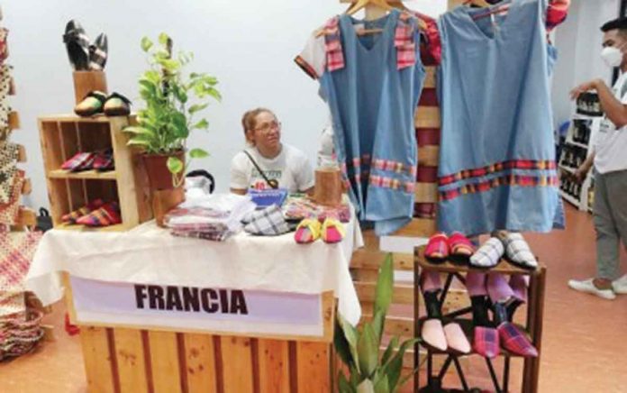 Dresses and shoes with “patadyong” or the handwoven fabric made in Antique are displayed at a recent trade and tourism fair. PNA FILE PHOTO BY ANNABEL CONSUELO J. PETINGLAY