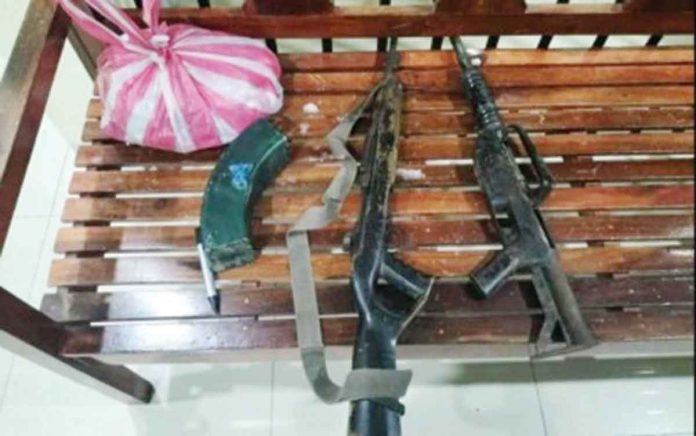 Law enforcers recovered firearms in a house on May 9, 2022 in Leon, Iloilo. Police provincial director, Colonel Adrian Acollador, said the suspect who eluded arrest served as vice secretary of District Committee II, Southern Front of Komite Rehiyon – Panay of the New Peoples’ Army. IPPO PHOTO