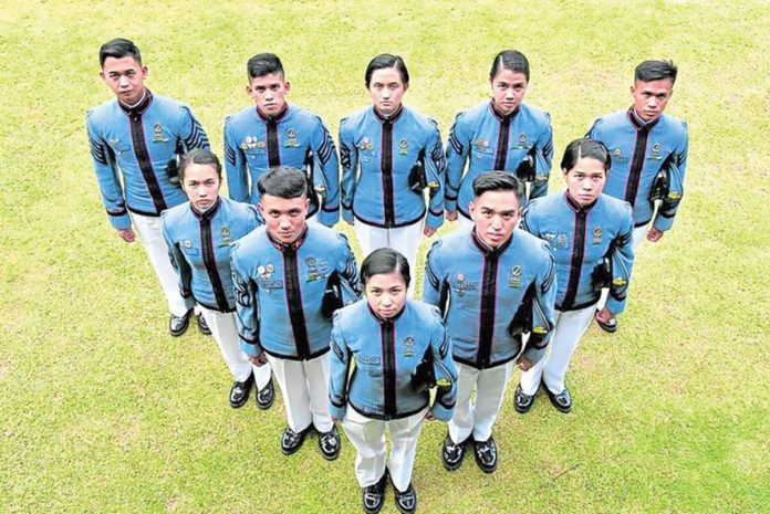 The top 10 graduates of the 214-member Philippine Military Academy’s “Bagsik Diwa” Class of 2022, led by Cadet First Class Krystlenn Ivany Quemado (bottom center), will be commissioned as junior officers on May 15 during their commencement exercises in Baguio City. EV ESPIRITU ©PHILIPPINE DAILY INQUIRER 2022