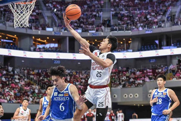 University of the Philippines Fighting Maroons’ Ricci Rivero loses control of the ball as he goes for a layup. UAAP MEDIA BUREAU