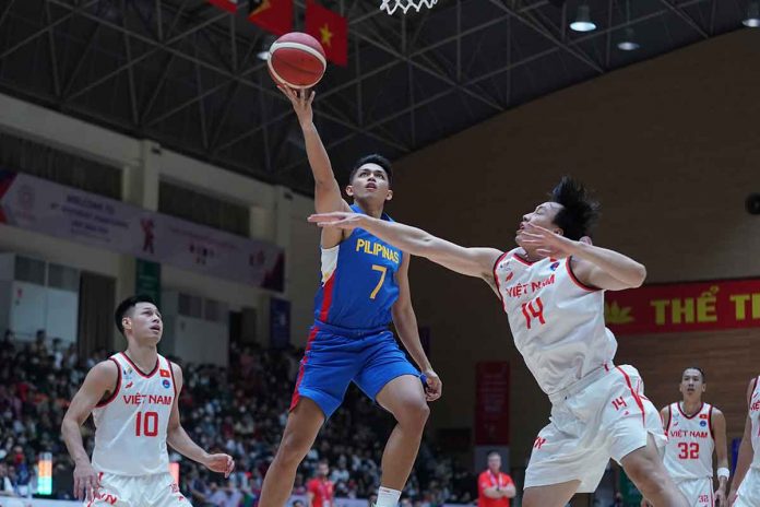 Gilas Pilipinas’ Frederick Tungcab attacks the Singaporean defense with a layup. PSC MEDIA PHOTO