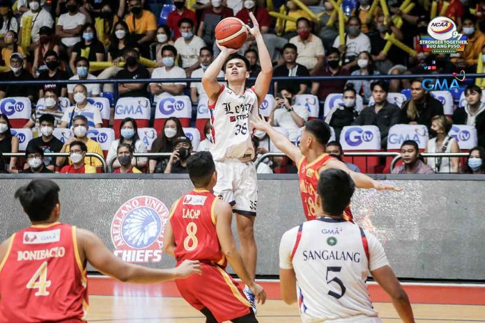 Colegio de San Juan de Letran Knights’ Brent Paraiso shoots over a Mapua Cardinals defender. PHOTO COURTESY OF NCAA/GMA SPORTS