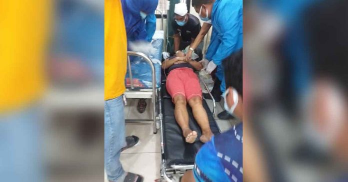 This photo from the police station of Sipalay City in Negros Occidental shows emergency personnel giving first aid to a victim of stabbing.