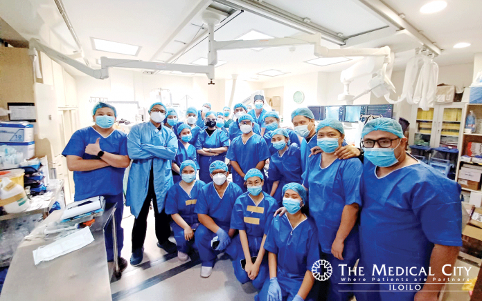 The Medical City Iloilo Cardiac Catherterization Team together with TMC Interventional Cardiologist-Peripheral Vascular Intervention Dr. Rowena Ona; TMC Iloilo Interventional Cardiologist Dr. James Catoto; and TMC Iloilo Thoracic and Cardiovascular Surgeon Dr. Leo Malunes pose after the successful Thoracic Endovascular Aortic Repair (TEVAR) which is the first in Western Visayas.