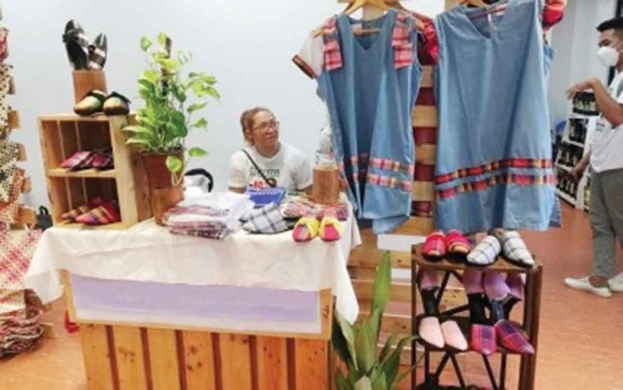 Dresses and shoes with patadyong fabric made in Antique are on display during a recent trade and tourism fair in San Jose, Antique. PNA FILE PHOTO BY ANNABEL CONSUELO J. PETINGLAY