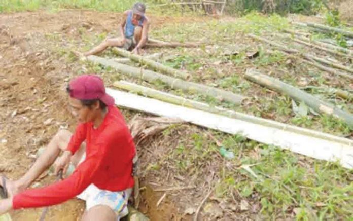 Members of a farmers’ association prepare for the launch of their sow-level swine multiplier and techno-demo farm project in Bingawan, Iloilo. The project to be launched on June 27 is a grant from the Agricultural Training Institute as part of the Department of Agriculture’s recovery and repopulation plan for the swine industry. PHOTO COURTESY OF CONCEPCION CARILLO