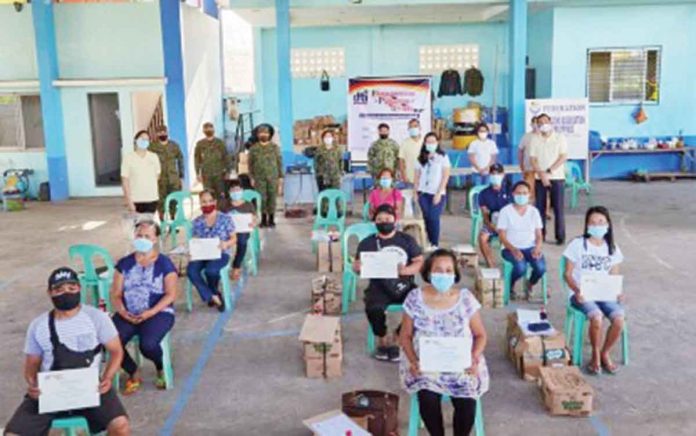 This undated photo shows the recipients of the Pagbangon at Ginhawa Program livelihood kits in Iloilo City. This year, the Department of Trade and Industry has allocated 40 livelihood kits for barangays that have been cleared from insurgents. DTI ILOILO PHOTO