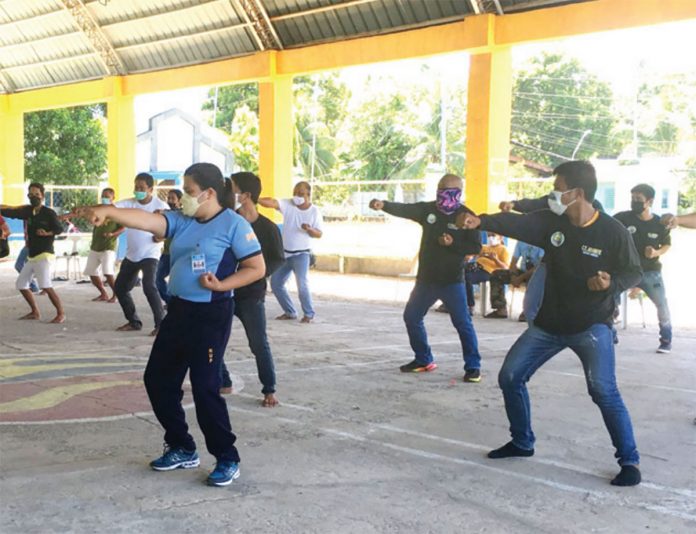 Barangay tanods flex their muscles with the help of the police of Pandan, Antique. PHOTOS FROM PANDAN MUNICIPAL POLICE STATION FACEBOOK PAGE