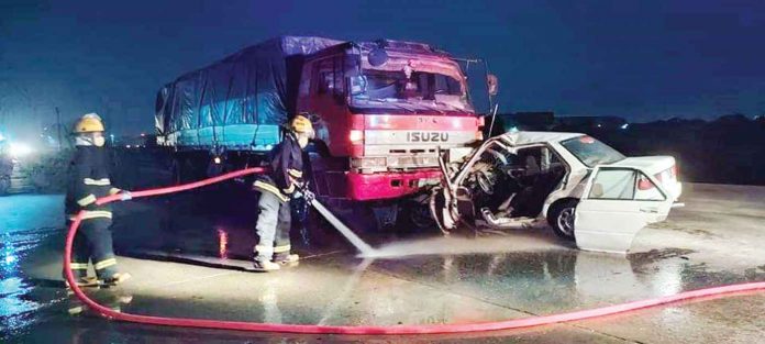 A cargo truck and a car figure in a head-on collision in this undated photo taken at the circumferential road in Barangay Tacas, Jaro, Iloilo City. Driver’s error and reckless driving are the two main causes of vehicular accidents, according to the police. PN FILE photo