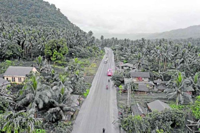 Mount Bulusan explodes on Sunday morning, after more than eight months of being under alert level 0, sending gray plumes into the sky and raining down ash on several villages in the towns of Juban and Irosin, Sorsogon, and forcing the evacuation of hundreds of families. PHOTO FROM THE SORSOGON PROVINCIAL INFORMATION SERVICE