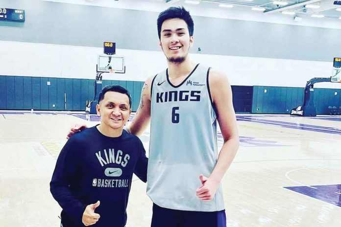 Filipino center Kai Sotto poses with retired PBA cager Jimmy Alapag who served as assistant coach for Stockton Kings, an NBA G-League affiliate of NBA squad Sacramento Kings. PHOTO COURTESY OF SACRAMENTO KINGS