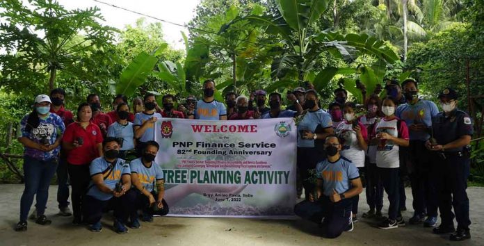 Regional Finance Service Office 6 personnel plant tree seedlings in Barangay Anilao, Pavia, Iloilo. Arnel John Palcullo/PN