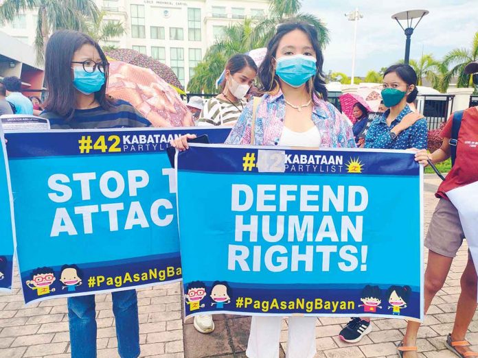 Youth activists press for the protection of human rights during a rally in Iloilo City on July 25 when President Ferdinand “Bongbong” Marcos Jr. delivered his first State of Nation Address at the Batasang Pambansa in Quezon City. ARNEL JOHN PALCULLO/PN