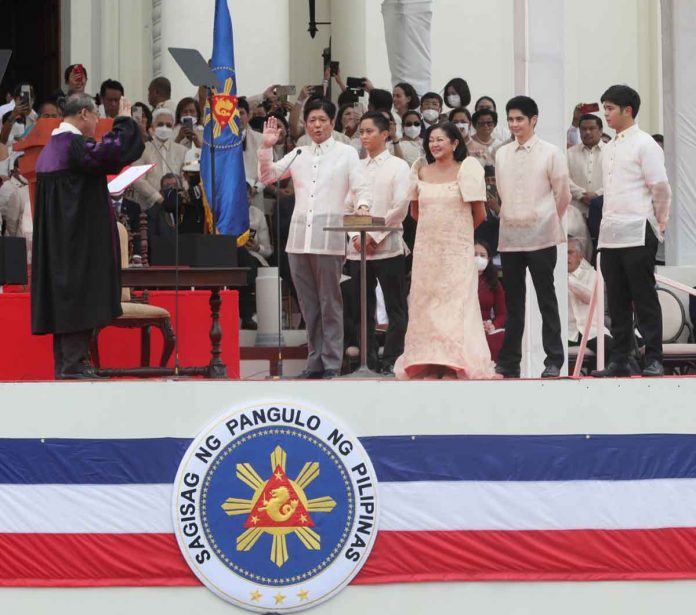 17TH PRESIDENT. President Ferdinand “Bongbong” Marcos Jr. takes his oath of office before Supreme Court Chief Justice Alexander Gesmundo at the National Museum in the City of Manila. Marcos, in his inaugural address, vowed to promote unity and bring progress to the country. PNA PHOTO BY AVITO C. DALAN