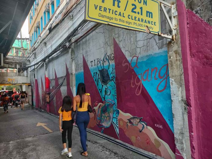 These murals on Delgado Street, Iloilo City are by a collective of artists, social innovators and unconventional movers working to bring engaging collaborative art to the heart of communities and unlikely locations. ARNEL JOHN PALCULLO/PN