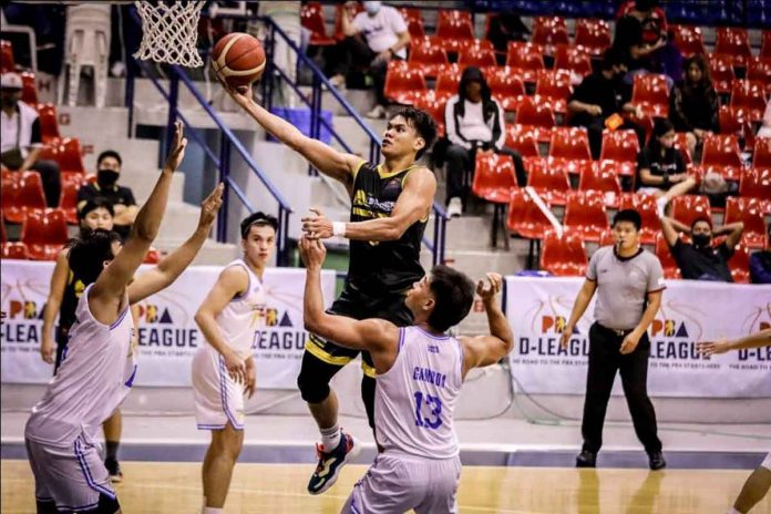 Builders Warehouse-UST Tigers’ Nicael Cabañero attacks the basket for a layup. PBA MEDIA BUREAU