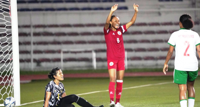 Philippine women’s football team’s Sarina Bolden celebrates after scoring on a goal against Indonesia. PHOTO FROM PHILIPPINE FOOTBALL FEDERATION