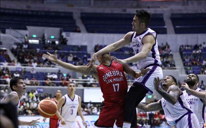 Barangay Ginebra San Miguel Kings’ Nard John Pinto is accidentally smacked on the face by Converge FiberXers’ Kevin Racal. PBA MEDIA BUREAU