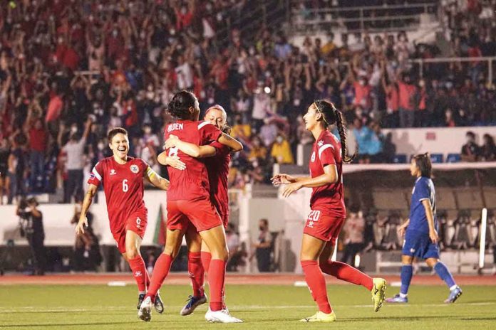 Members of the Philippine women’s football team hug after notching their 2022 AFF Women’s Championship with a 3-0 victory over Thailand. PFF PHOTO