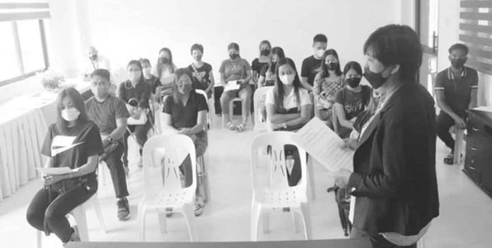 Mary Grace Samulde, Public Employment Service Office officer-in-charge, orients the 15 recipients of the Department of Labor and Employment’s Government Internship Program. MAYOR'S OFFICE - PANDAN, ANTIQUE/FB