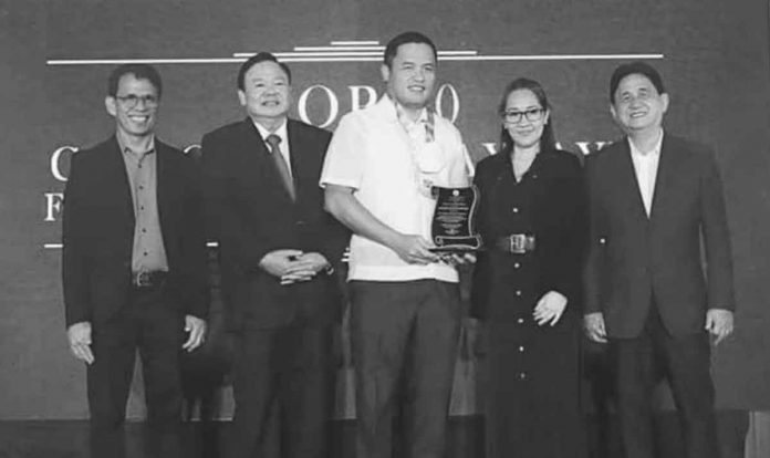 TOP TAXPAYER. Representatives from Panay Energy Development Corporation (PEDC) headed by its First Vice President-Panay Site Head, Atty. Antonio J. Cabalhug Jr., receive a plaque of recognition during the awarding ceremony for top taxpayers in Iloilo City. PEDC topped both in the real property tax and business under Corporation category. JERRY TREÑAS/FB