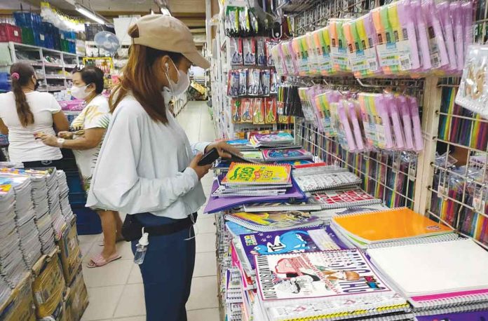 Aside from being particular with the prices, consumers should also check the quality and quality of the school supplies they are buying, says Director Felisa Judith Degala of the Department of Trade and Industry – Iloilo shown here holding a suggested retail price list for school supplies. DTI has also issued guidelines when buying pad papers, crayons, pencils, and ballpens, among others. ARNEL JOHN PALCULLO/PN