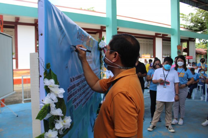 Michael S Guanco, MGEN – GBP Community Relations Officer signed the Pledge of Commitment in support of Brigada Eskwela 2022.