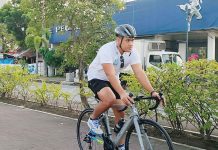 A biker does his morning routine – conquering Iloilo City’s bike lanes to start the day.