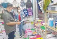 Trade and Industry Development Specialist Glen Fernando monitors the prices of school supplies in a store in San Jose, Antique. PHOTO COURTESY OF DTI-ANTIQUE