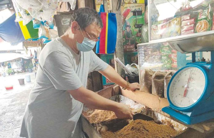 Iloilo Central Market vendor Jose Jocon has temporarily stopped selling refined or white sugar. He says his customers no longer buy refined sugar because it has become expensive. Jocson currently sells just brown sugar. A shortage in the supply of refined sugar is being blamed for the increase in its price in the markets. ARNEL JOHN PALCULLO/PN