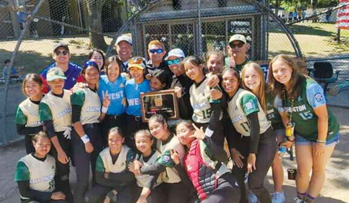 Bago City players, representing Asia-Pacific, gather after finishing with a bronze medal in the 2022 Junior League Softball World Series. LITTLE LEAGUE PHILIPPINES PHOTO