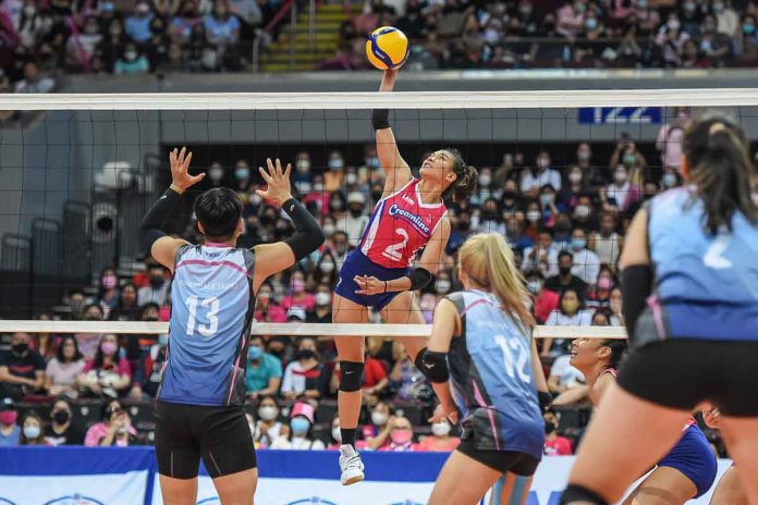 Creamline Cool Smashers’ Alyssa Valdez unloads an attack against the defense of two KingWhale-Taipei players. PVL MEDIA BUREAU