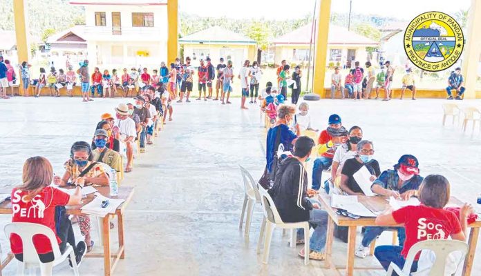 Indigent senior citizens of Pandan, Antique queue to receive their social pension for the third quarter of the year. MAYOR'S OFFICE-PANDAN, ANTIQUE/FB