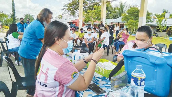 The Capiz provincial government through the Provincial Health Office conducts COVID-19 mobile vaccination in barangays Bungsuan and Dacuton in Dumarao, Capiz on Sept. 7, 2022. CAPIZ PROVINCIAL HEALTH OFFICE