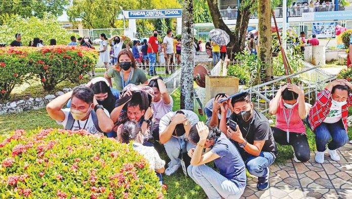 Employees of the Pandan municipal government actively participate in the Sept. 8 nationwide simultaneous earthquake drill. PANDAN MAYOR TOMAS U. ESTOPEREZ, JR.