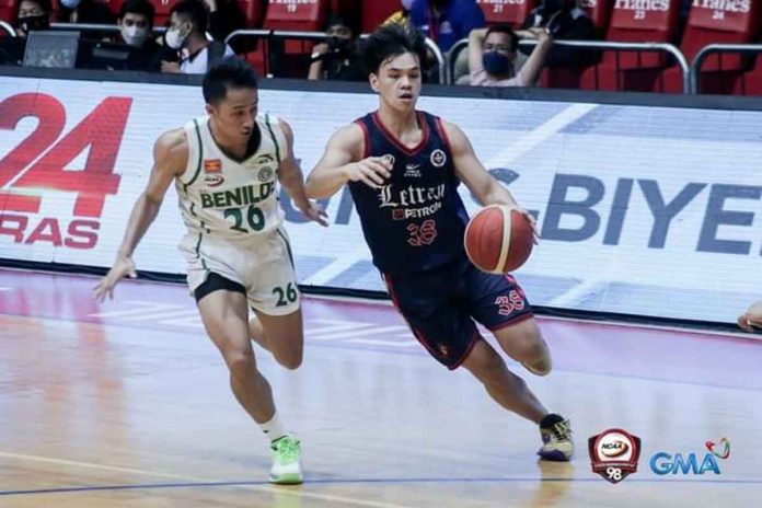 Colegio de San Juan de Letran Knights’ Brent Paraiso breaks away from the defense of College of St. Benilde Blazers’ JC Cullar to attack the basket. PHOTO COURTESY OF NCAA/GMA