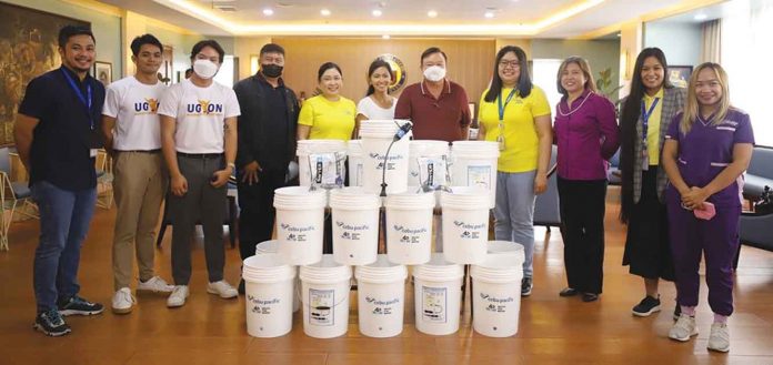 Cebu Pacific and Waves For Water Philippines turn over filtration systems to the city and provincial government of Iloilo.