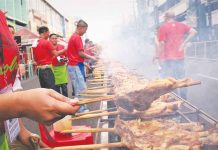 Savor even just by smelling. Not only the activities during Masskara Festival fill the streets of Bacolod City but also smoke coming from rows and rows of charcoal-grilled Bacolod chicken inasal. (PN File Photo)