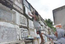 CLEANING TOMBS. This early, family members such as this man at the Pavia Catholic Cemetery in Pavia, Iloilo start cleaning the tombs of their departed loved ones in preparation for the observance of “Piesta Minatay”. AJ PALCULLO/PN