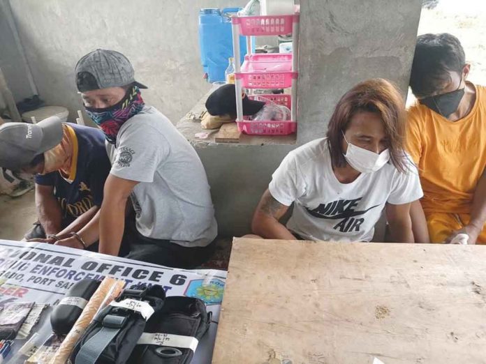 Authorities confiscate 35 heat-sealed plastic sachets of suspected shabu with a standard drug price of P1,020,000 from drug suspects Reynaldo Cabintoy, Nicanor Tremucha, Ivan Tacdoro, and Richard Selerio on Thursday, Oct. 6, 2022. ILOILO CITY POLICE STATION 1 PHOTO