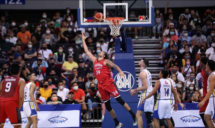 Barangay Ginebra San Miguel Kings’ Christian Standhardinger goes for a reverse basket. PBA MEDIA BUREAU